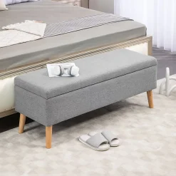 Banc coffre de rangement style scandinave piètement éffilé incliné bois hévéa tissu gris