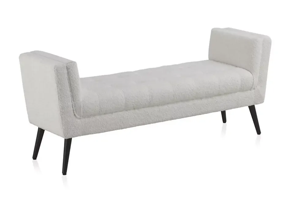 Banc recouvert de tissu blanc et pieds en bois noir