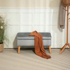 Banquette coffre design scandinave piètement effilé bois assise effet capitonné velours gris