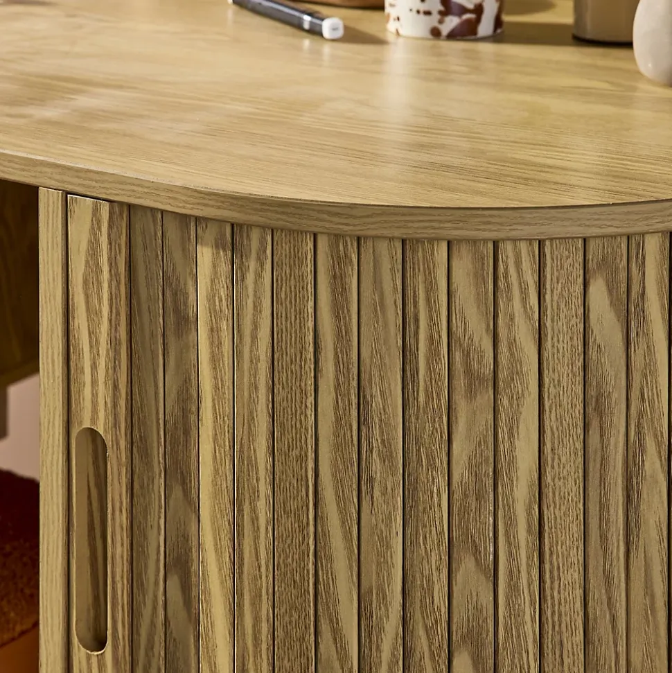Bureau ovale décor bois rainuré avec deux espaces de rangement. L 120 x P 55 x H 77 cm
