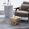 Pouf repose-pieds style nordique piètement bois incliné tissu assise effet capitonné marron