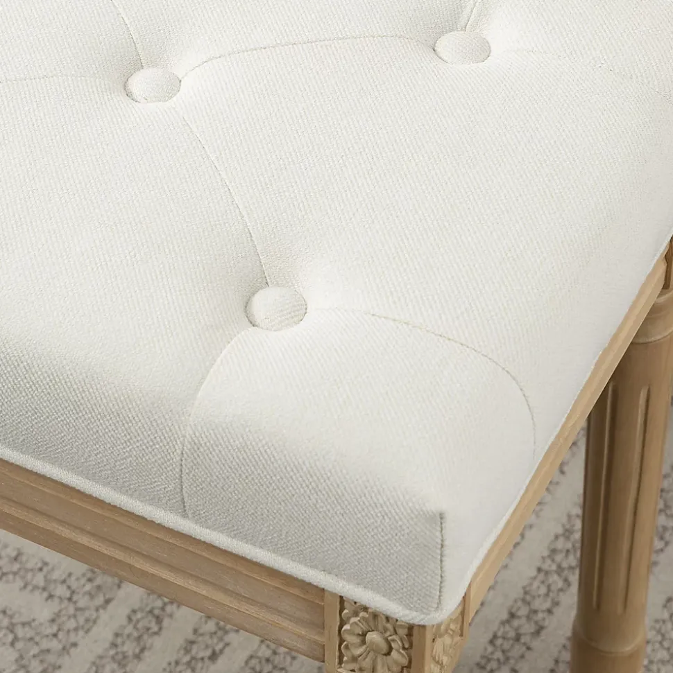 Tabouret repose-pied capitonné style classique bois sculpté patiné tissu toucher lin beige