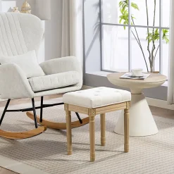 Tabouret repose-pied capitonné style classique bois sculpté patiné tissu toucher lin beige