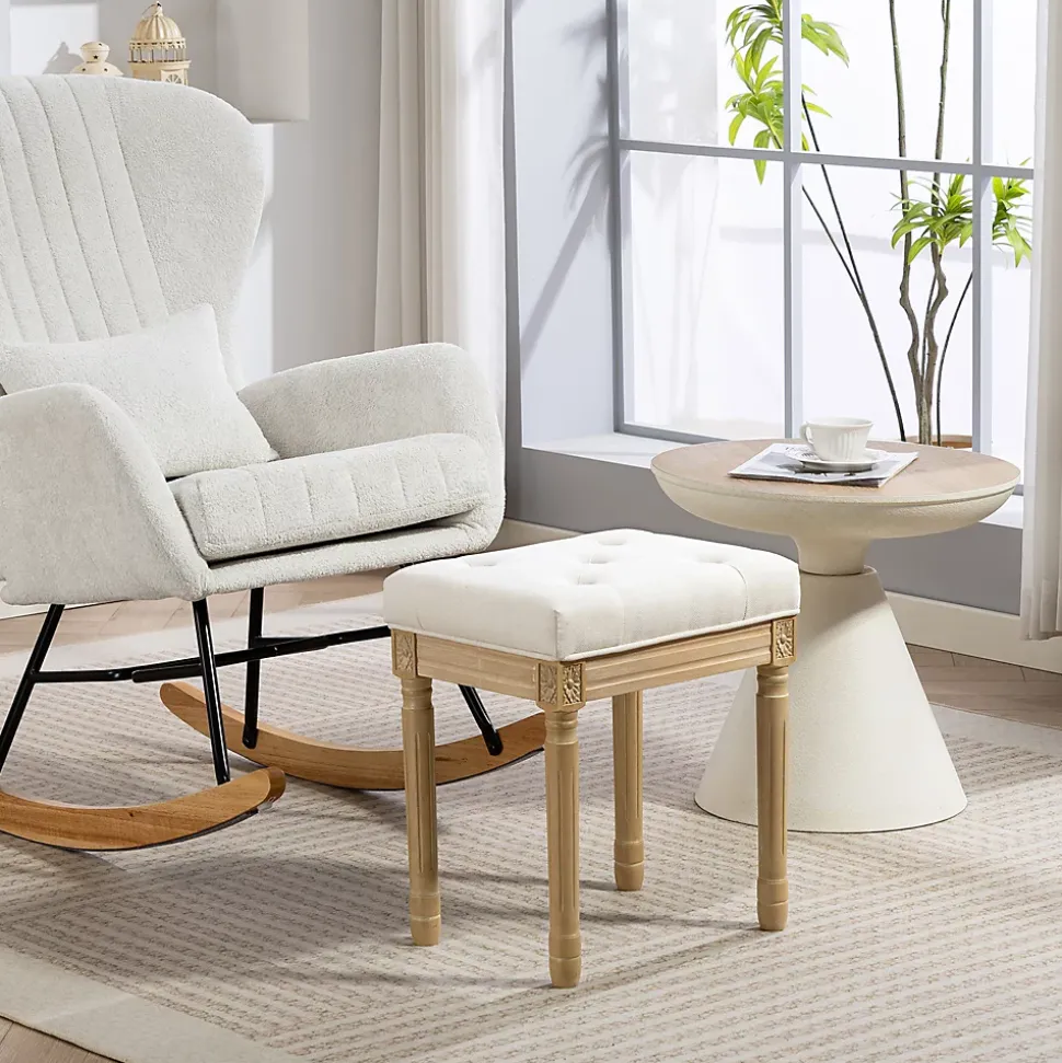 Tabouret repose-pied capitonné style classique bois sculpté patiné tissu toucher lin beige