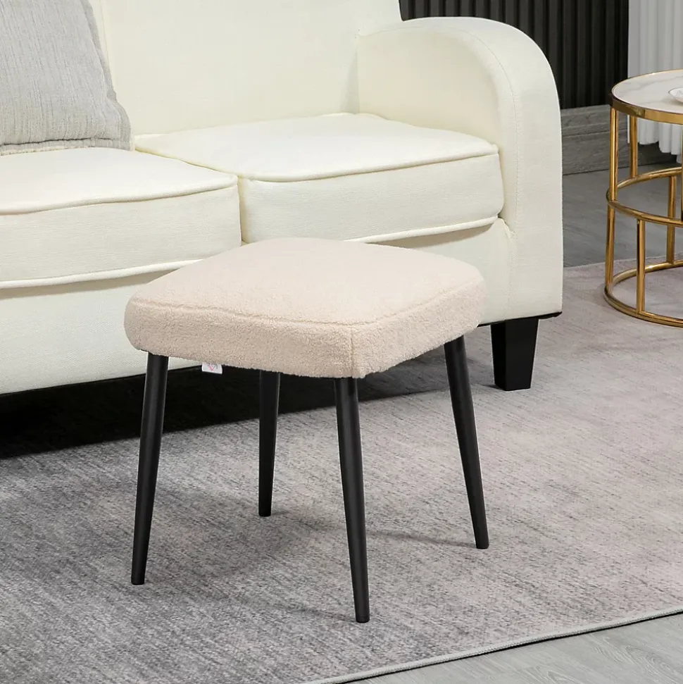 Tabouret repose-pieds design bouclette beige piètement effilé incliné acier noir